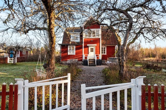 Front view of the main house and garden