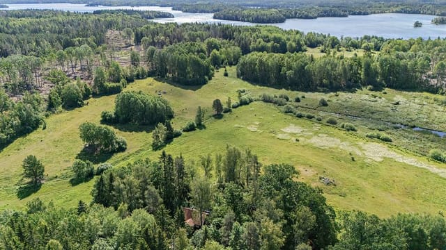 Front view of the red cottage
