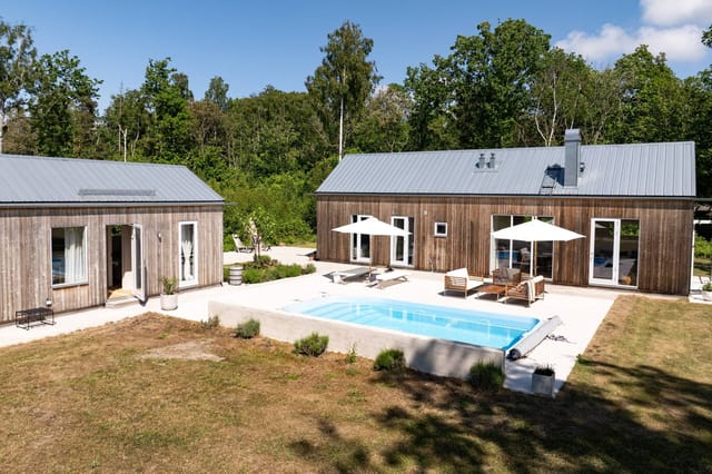 Exterior view of the main house and pool