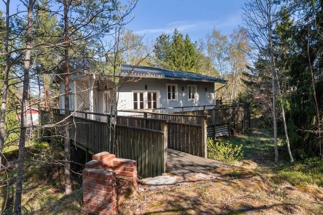 Front view of the house and garden
