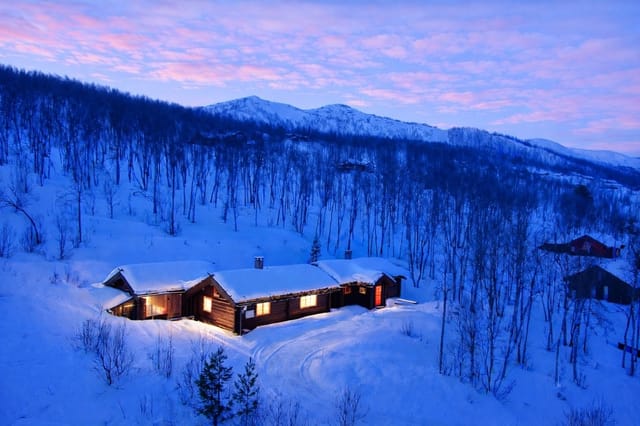 Front view of the log cabin and annex