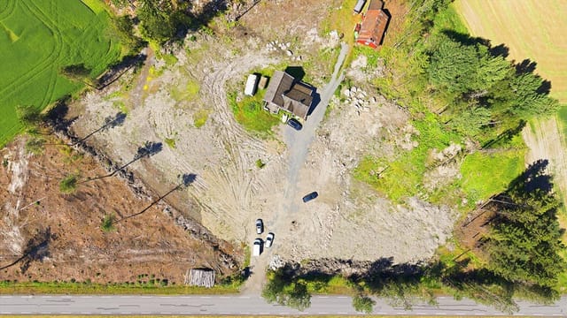 A large plot with potential for those ready for a comprehensive project.