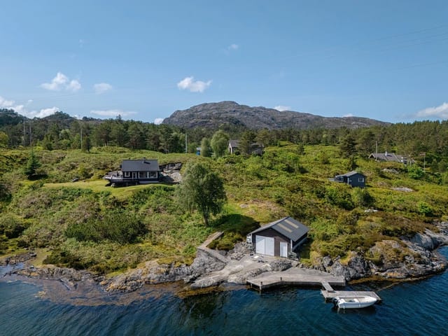 Welcome to Havrevågen. A fantastic leisure property with large boathouse, deep-water pier, and shoreline