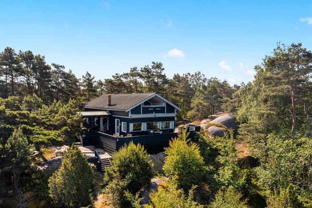 Beautiful cabin property with idyllic outdoor spaces by the water's edge