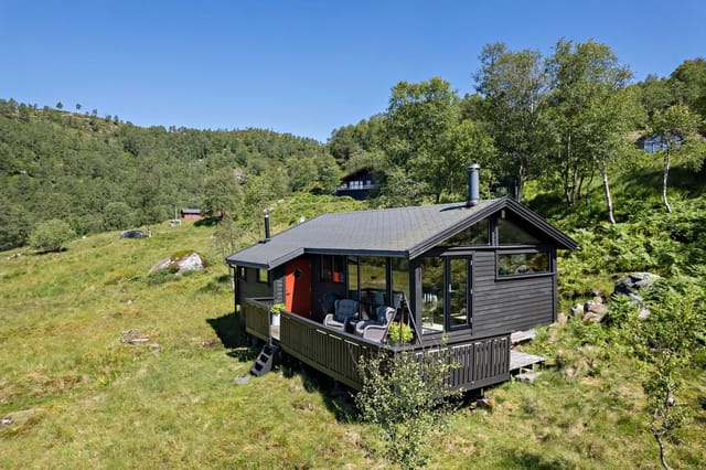 Tasteful, beautiful cabin with a stunning location.