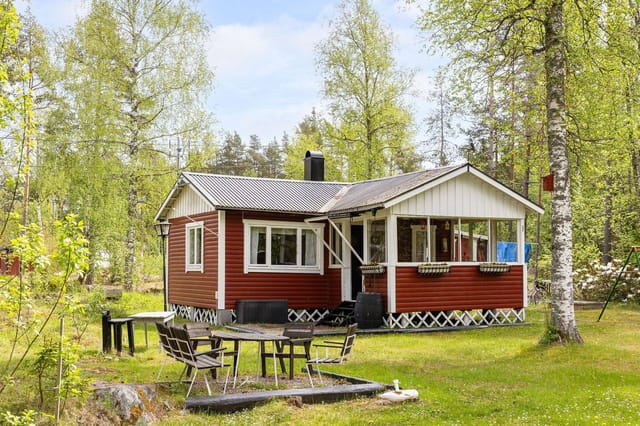 Front view of the red cottage