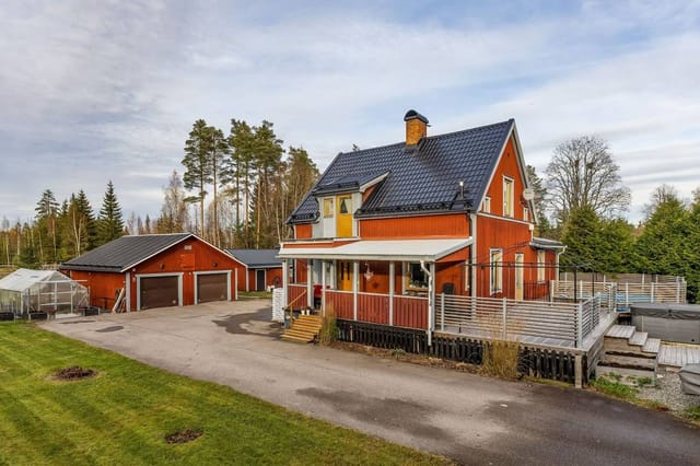 Front view of the house and garden