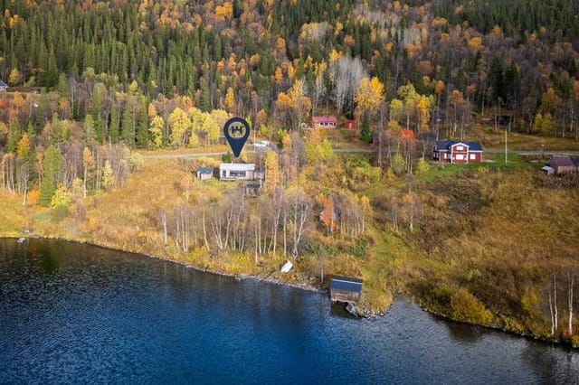 Exterior view of Grundfors 51 with mountain backdrop