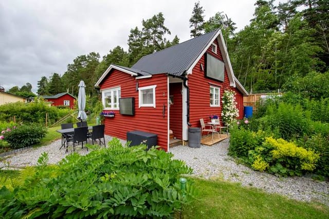 Front view of the cottage and garden