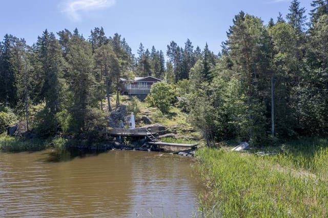 Main house and pool with sea view