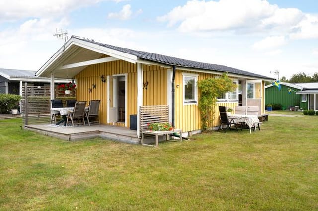 Front view of the cottage and garden