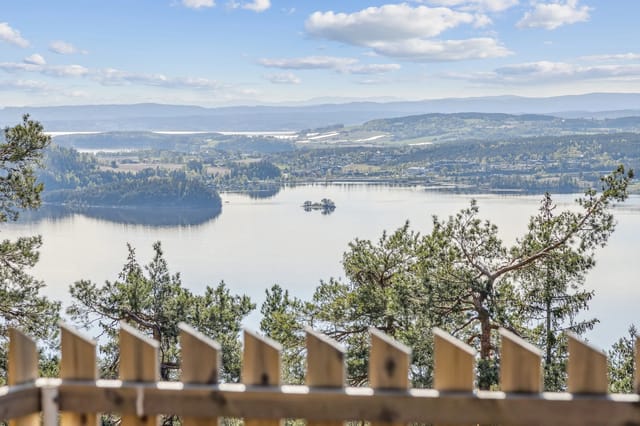 Front view of the cabin with panoramic fjord views