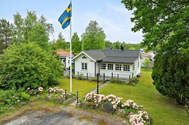 Front view of the house and garden