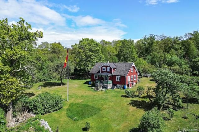 Front view of the house and garden
