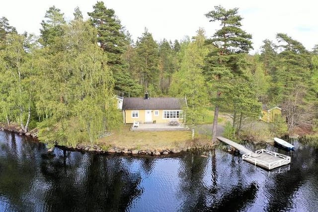 Exterior view of the house and lake