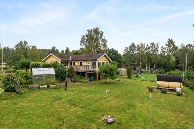 Front view of the house and garden