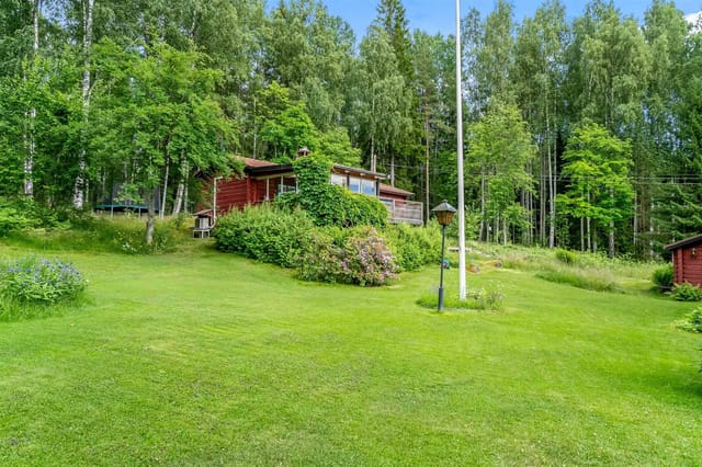 Exterior view of the main cottage and garden
