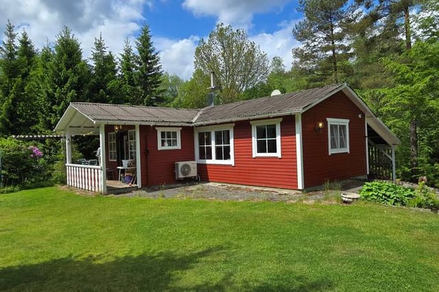 Front view of the house and garden