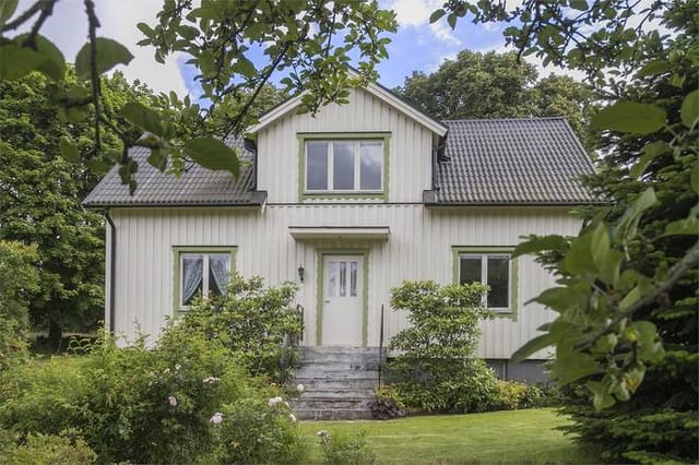 Front view of the house and garden