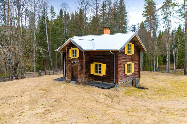 Exterior view of the timbered cottage
