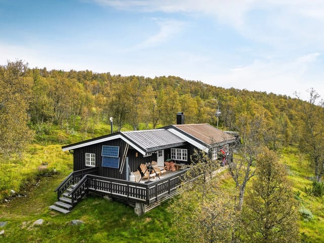 Front view of the cabin in natural surroundings