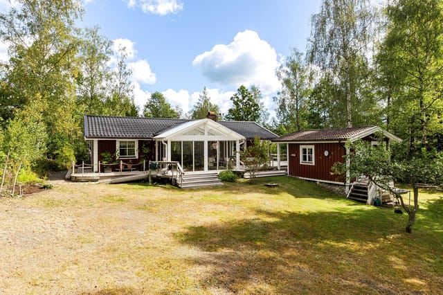 Front view of the house and garden