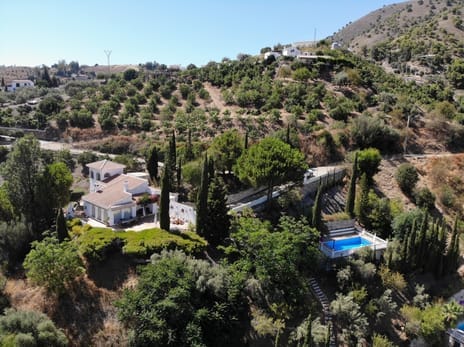 Front view of the villa with mountain backdrop