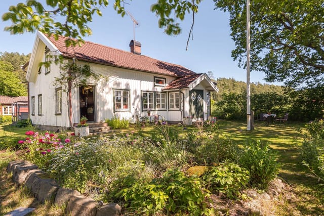 Exterior view of the main house and garden
