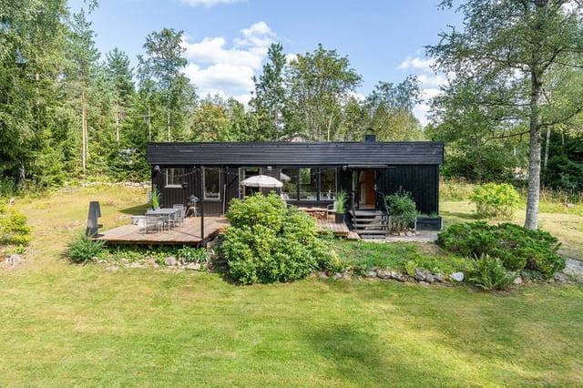 Front view of the house and garden
