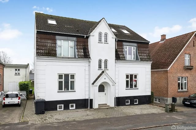 Living room with large windows and natural light