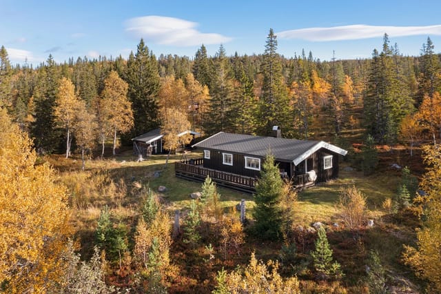 Welcome to Skillerbekkveien 74 – A charming and beautiful cabin by Funnsjøen in Meråker municipality.