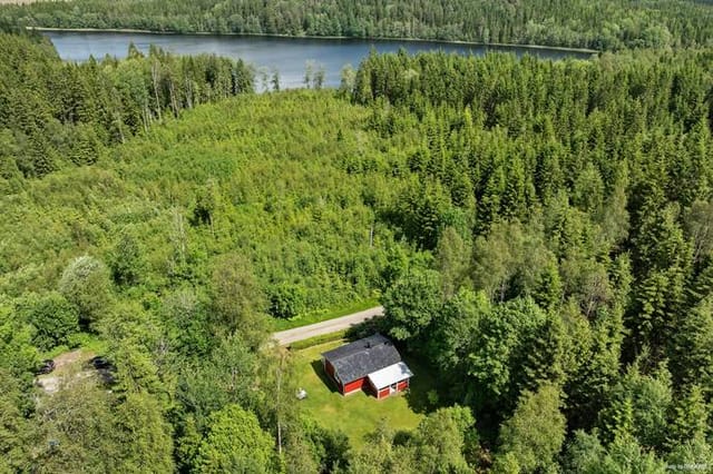 Front view of the red cottage
