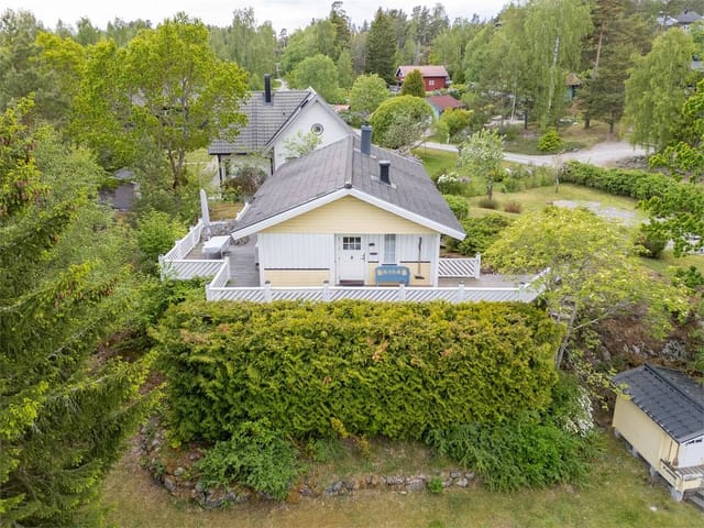 Front view of the house and garden