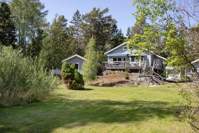 Front view of the house and garden