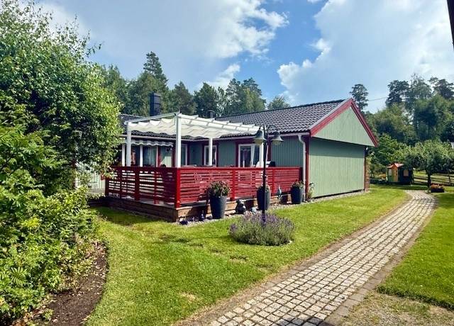 Front view of the house and garden