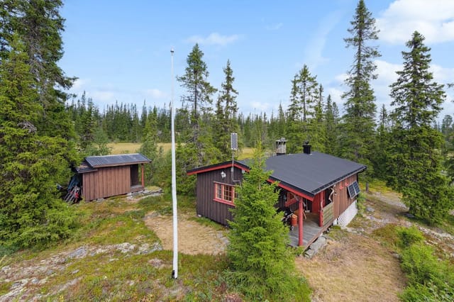 Charming cabin in a peaceful area with scenic surroundings.