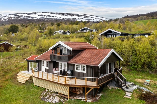Front view of the cabin and garage
