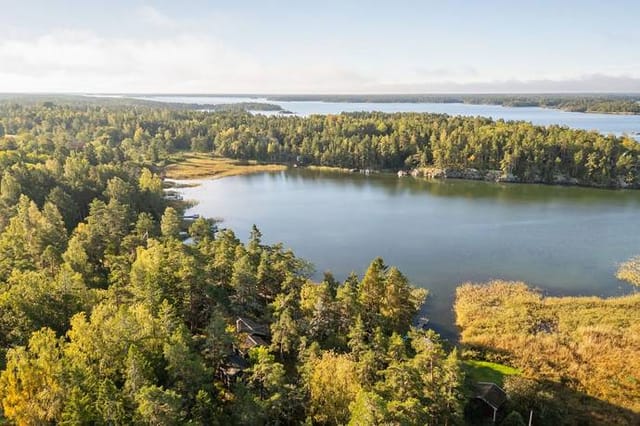 Main house exterior with water view