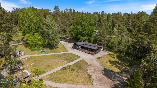 Front view of the house and garden