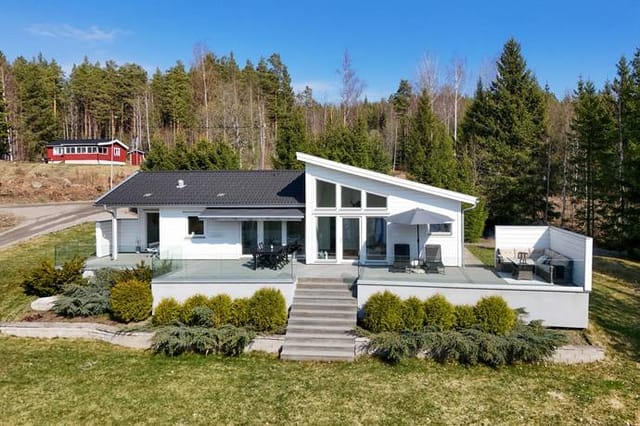 Exterior view of the house and lake