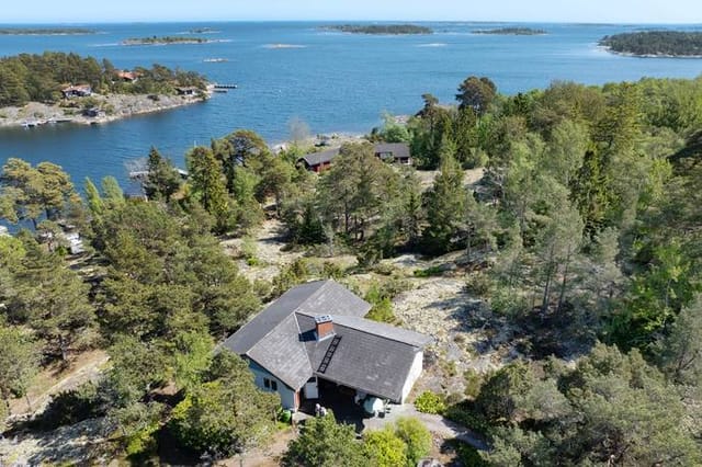 Main house and pool with sea view