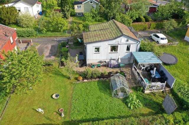Exterior view of the cottage and garden