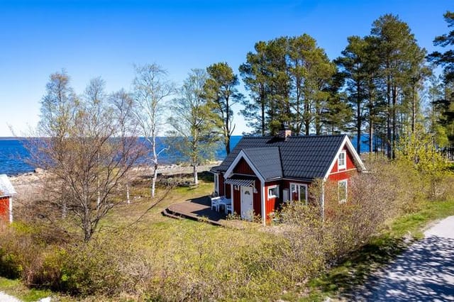 Exterior view of the house with sea in the background