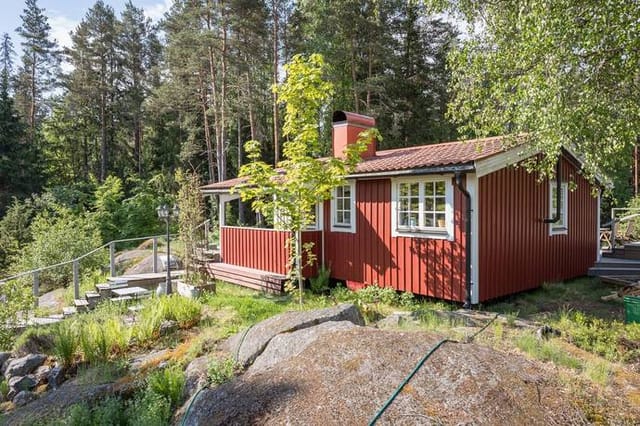 Front view of the cottage and garden