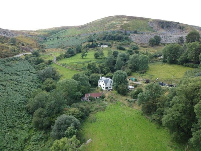 Aerial view of the farmhouse and land