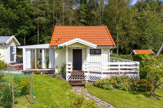 Front view of the cottage and garden
