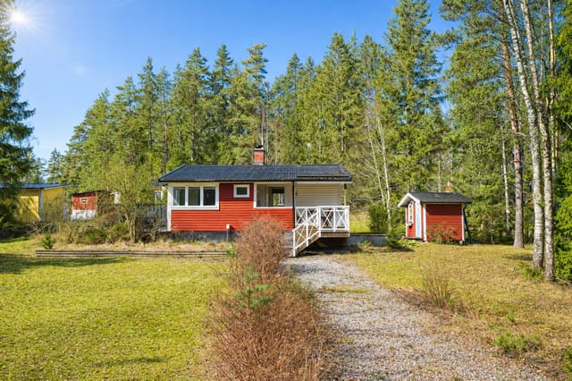 Front view of the cottage and garden