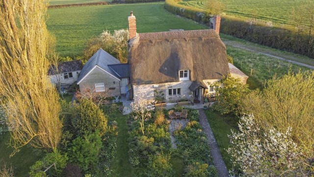 Front view of the thatched cottage