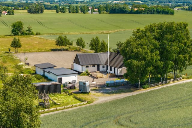 Front view of the villa and stables