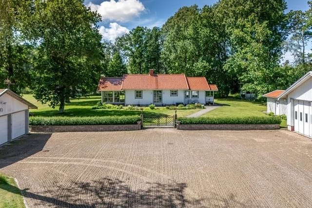 Front view of the country home and garden